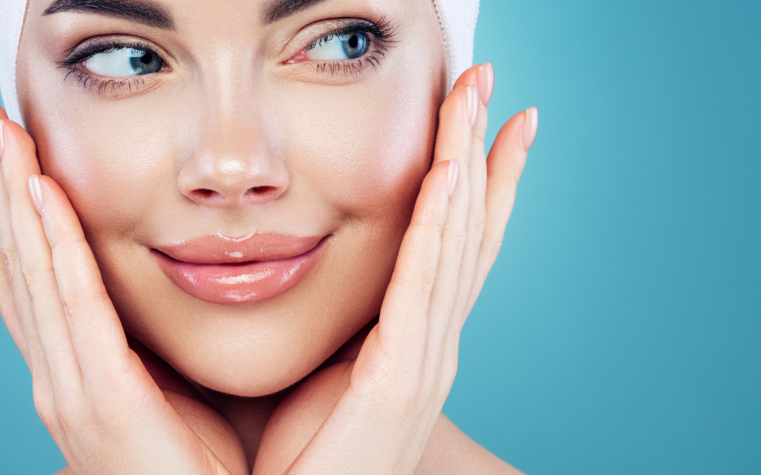 Professional skincare expert applying a nourishing facial mask in a med spa.